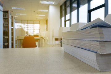 Old books on the table in library.