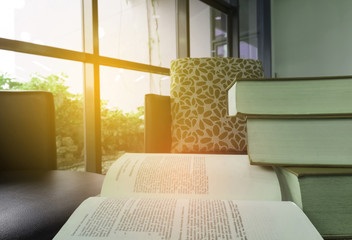 Old books on the table in library.