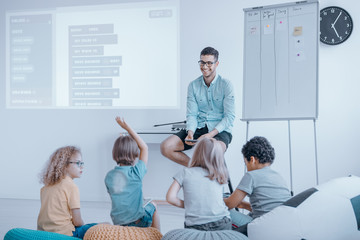 Group of happy children learn coding