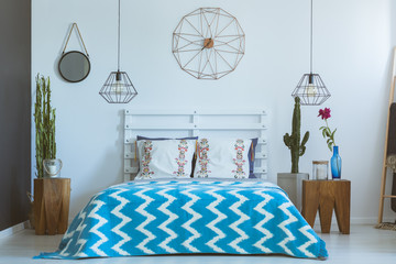 Ethnic bedroom, copper clock, lamps