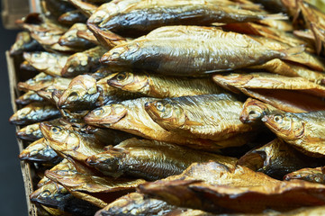 Smoked fish on the counter of the store  