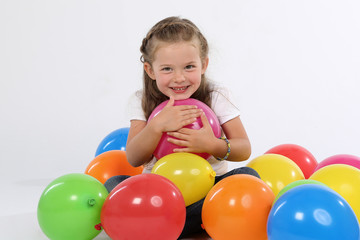 Fototapeta na wymiar Kind mit Luftballons