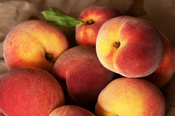 Fototapeta na wymiar Homegrown juicy peaches from the garden. Organic