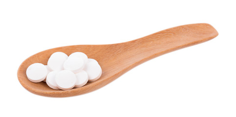 white pills isolated on white background