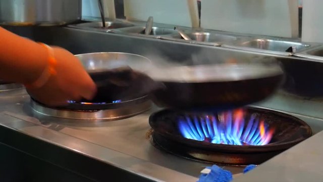 Chef prepares cooking in a restaurant 