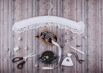 Background with sewing tools and accessories.