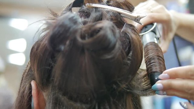 Laying of evening hairstyles