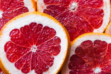 Grapefruit background. Healthy food and diet. Close up. Flat lay. Top view.