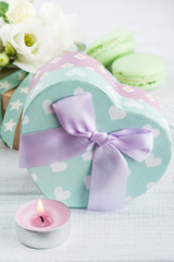 Gift box and bow and macaroons