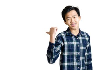 Portrait of a young businessman pointed his hand to left side. Isolated on white background with copy space and clipping path