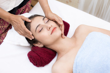 Fototapeta na wymiar Close up of Beautiful young woman having head massage in spa salon wellness, Beauty healthy lifestyle and relaxation concept.