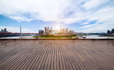 Obraz premium andscape of downtown near water of chongqing in blue sky