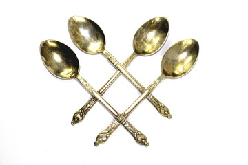 Antique Spoons on White Background