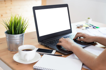 young  woman working  laptop computer  on wood desk ,Empty notebook