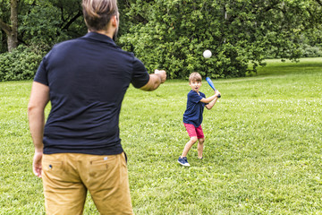 Fototapeta premium Happy father and his son playing baseball