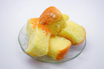 Soft butter buns (fresh bread crumbs)  on white plate and white background