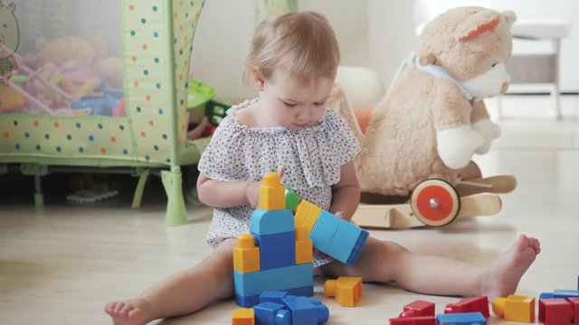 child little girl playing wooden toys at home or kindergarten, baby kid intellectual games children's desinger