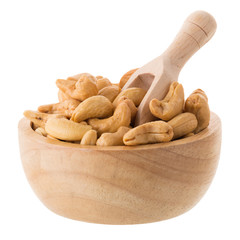 Closeup of cashew nuts in a wooden bowl isolated on white background