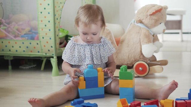 child little girl playing wooden toys at home or kindergarten, baby kid intellectual games children's desinger