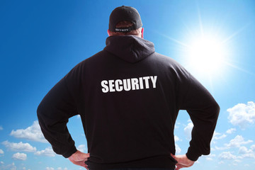 security man in a sunny day