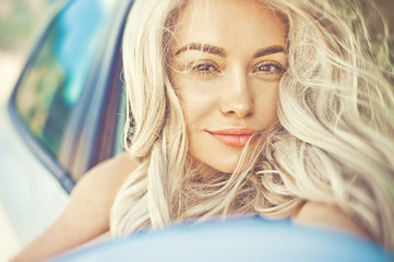 Beautiful blonde in car - 165834729