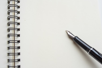 mock up top view pen on paper sheet white background