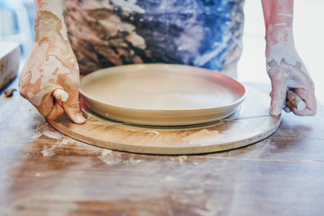 Plate being made in a  pottery class