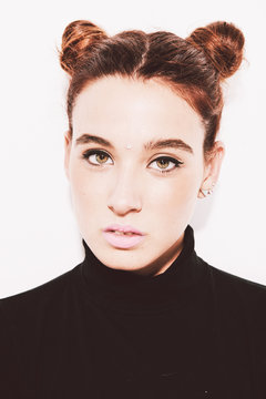 Beautiful girl with pigtails.