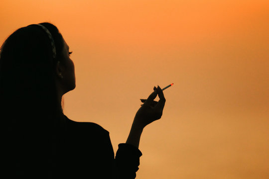 A woman smoking cigarette