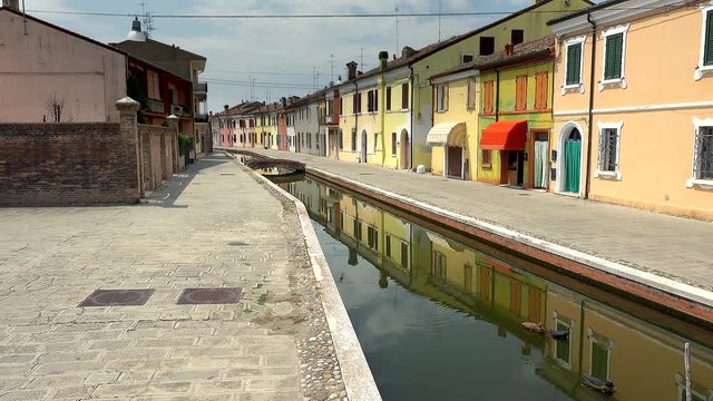 the Venetian style of the streets of Comacchio, ancient village near Ferrara, color graded clip