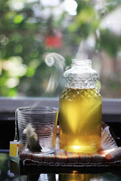 Hot tea in the morning after brewing, tea bags cooling