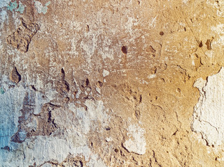 Texture of the old wall with traces of paint, grout and cement