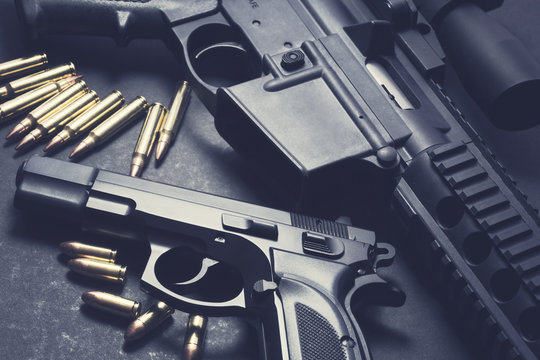 Assault rifle with handgun and ammunition. Military weapon