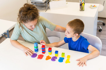 teacher woman learn  preschooler boy to count