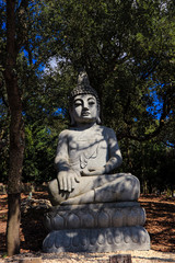 Fototapeta na wymiar Stone statue of buddha