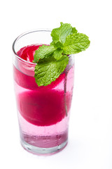 refreshing cocktail with red ice balls