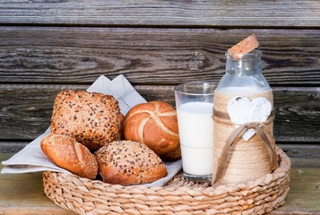 Breakfast fresh buns with milk or yogurt