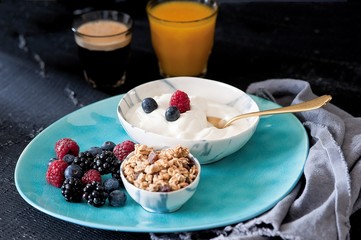 Healthy breakfast, muesli, juices and yogurt