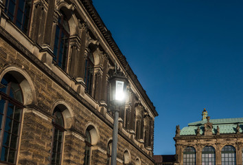 Fototapeta na wymiar The old buildings in city Dresden against sky