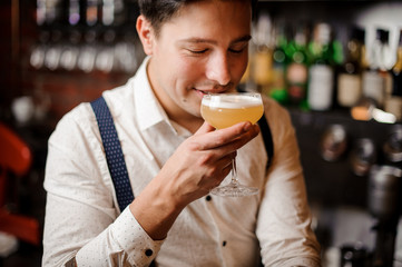smiling bartender with coctail