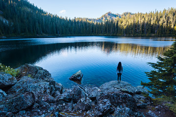 Girl on the mountain lake