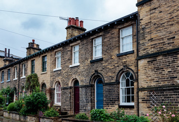Fototapeta na wymiar Victorian buildings on Victoria Road, Saltaire, Bradford