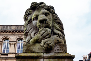 Fototapeta premium Lion statue by T.Milnes of London, outside Victoria Hall, Saltaire