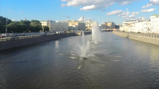 Fountains on the river at summer time timelapse