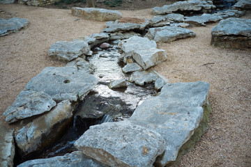 Creek in the spring park on a sunny morning