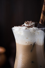 Iced coffee on wooden background