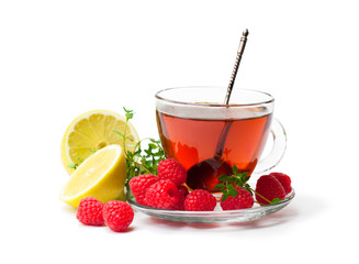 Red  fruit tea with lemon and raspberry isolated on white background
