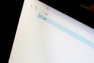 Close-up macro of computer screen with search for 