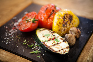 Grilled vegetables on a stone board