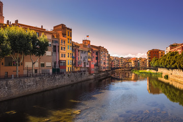 Girona. Multi colored facades of houses on the river Onyar.